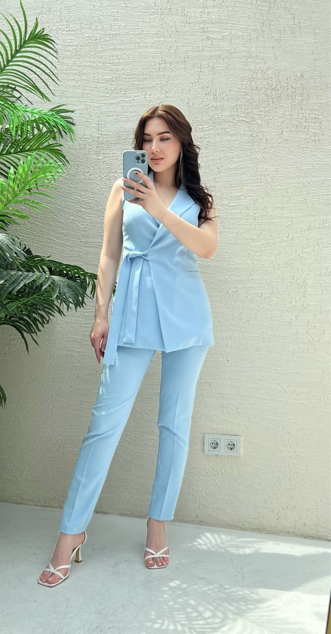 Elevate your wardrobe with a Baby Blue wrap vest