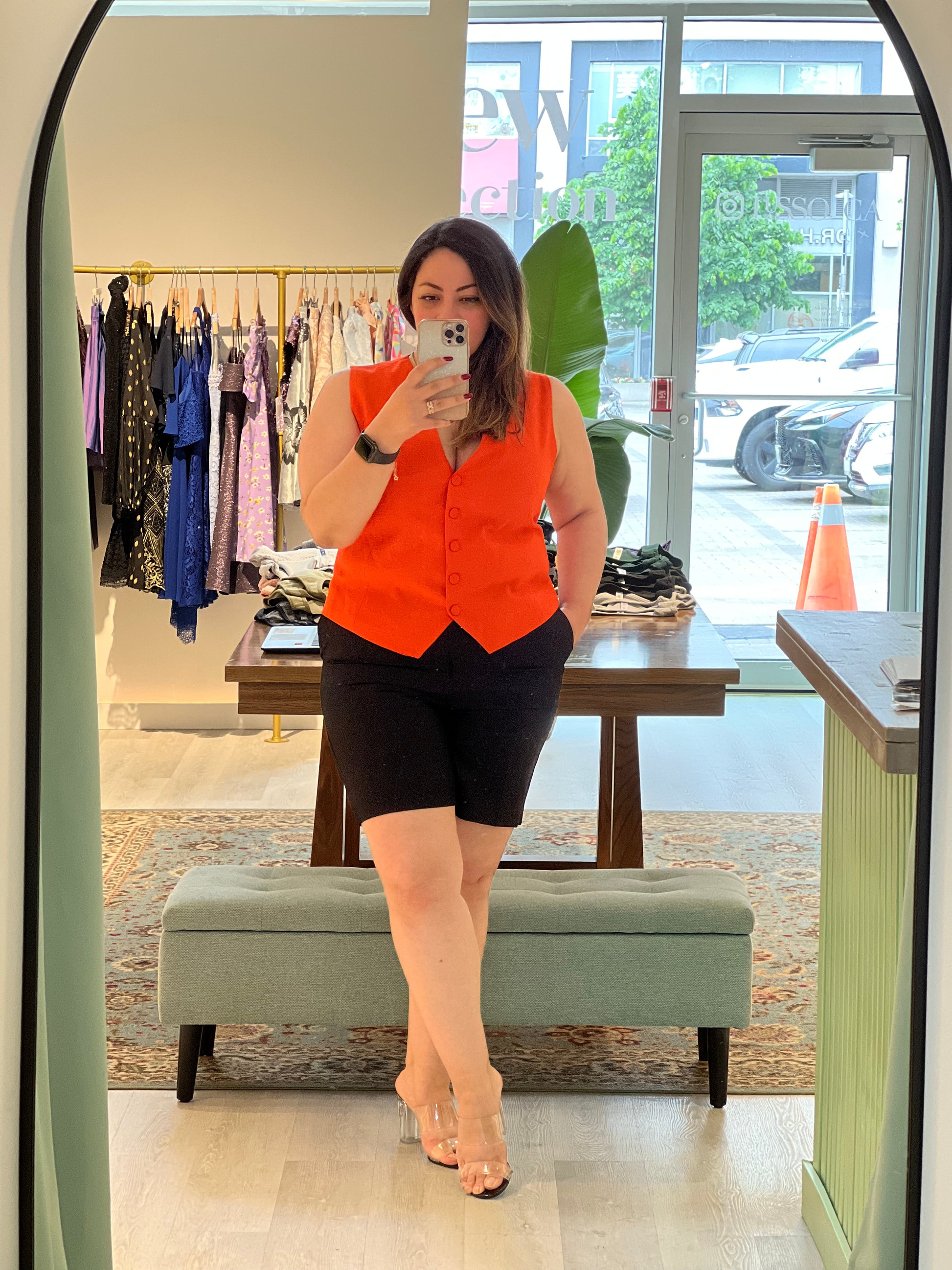 Vibrant orange vest for coordinating with different colored bottoms