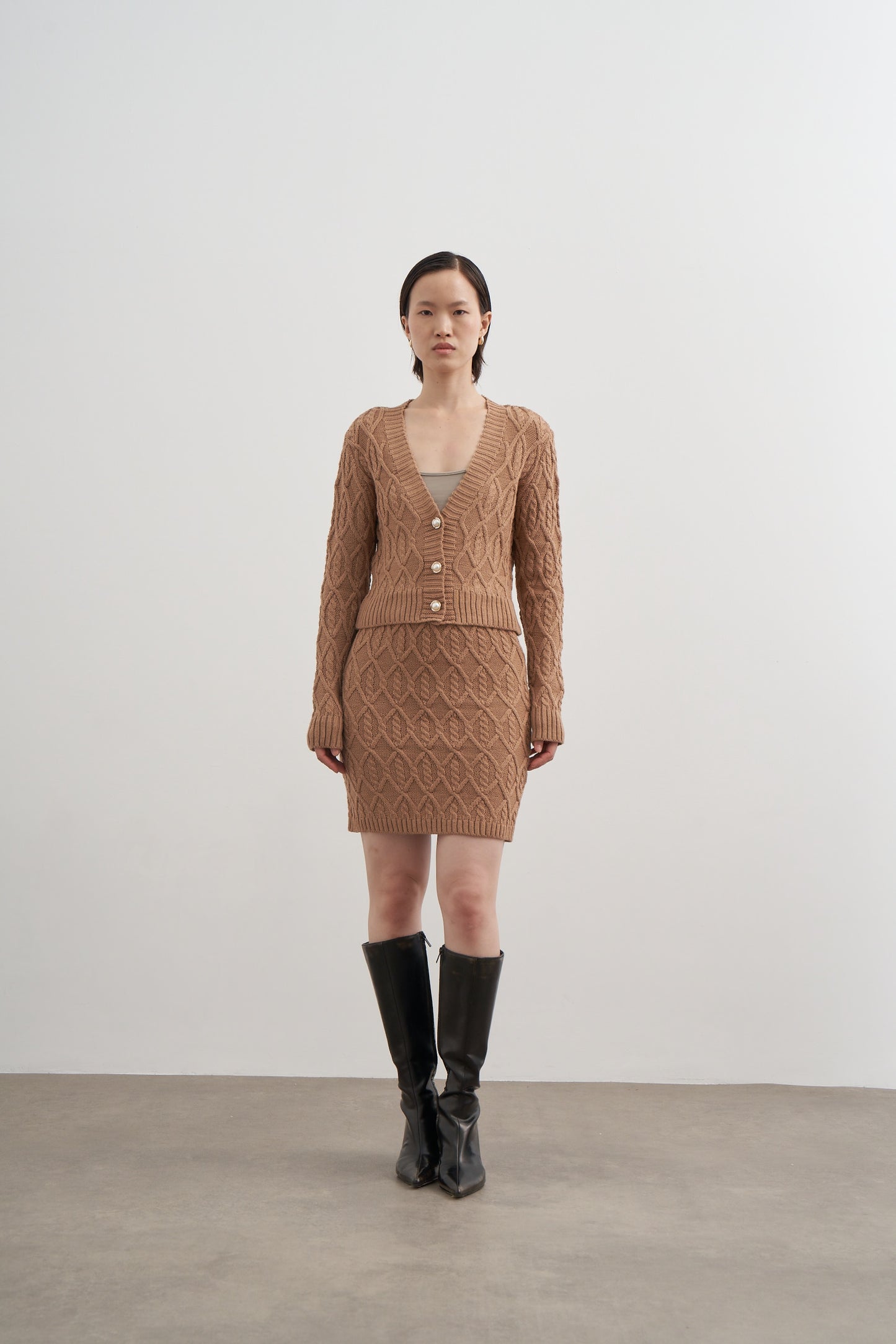 Twisted knitwear two pieces, cardigan skirt set